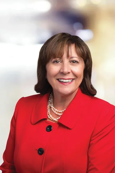 Portrait of Angela Liuzzo, REALTOR® | ABR®.